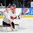 TORONTO, CANADA - JANUARY 3:  Switzerland's Gauthier Descloux #29 reaches to make a glove save against Team Germany during relegation round action at the 2015 IIHF World Junior Championship. (Photo by Andrea Cardin/HHOF-IIHF Images)

